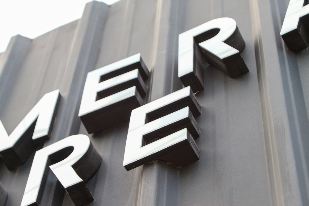 Chrome,letter,sign,for,company,brand.,hang,over,aluminium,font
