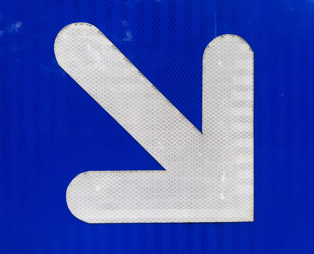 Guide,passers By,and,bicycle,signs,at,night.,blue,traffic,sign